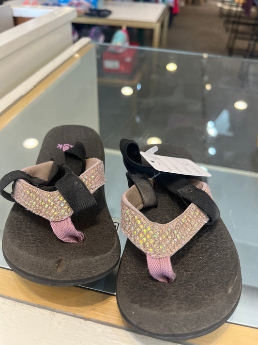 Sanuk 6